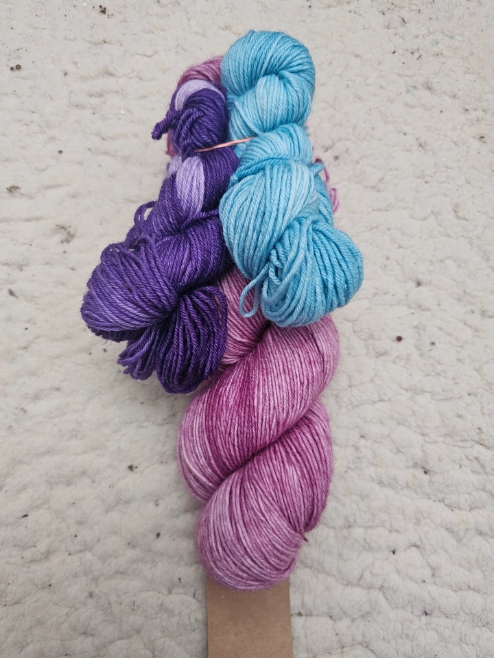 dark pink + minis turquoise and dark purple highlights